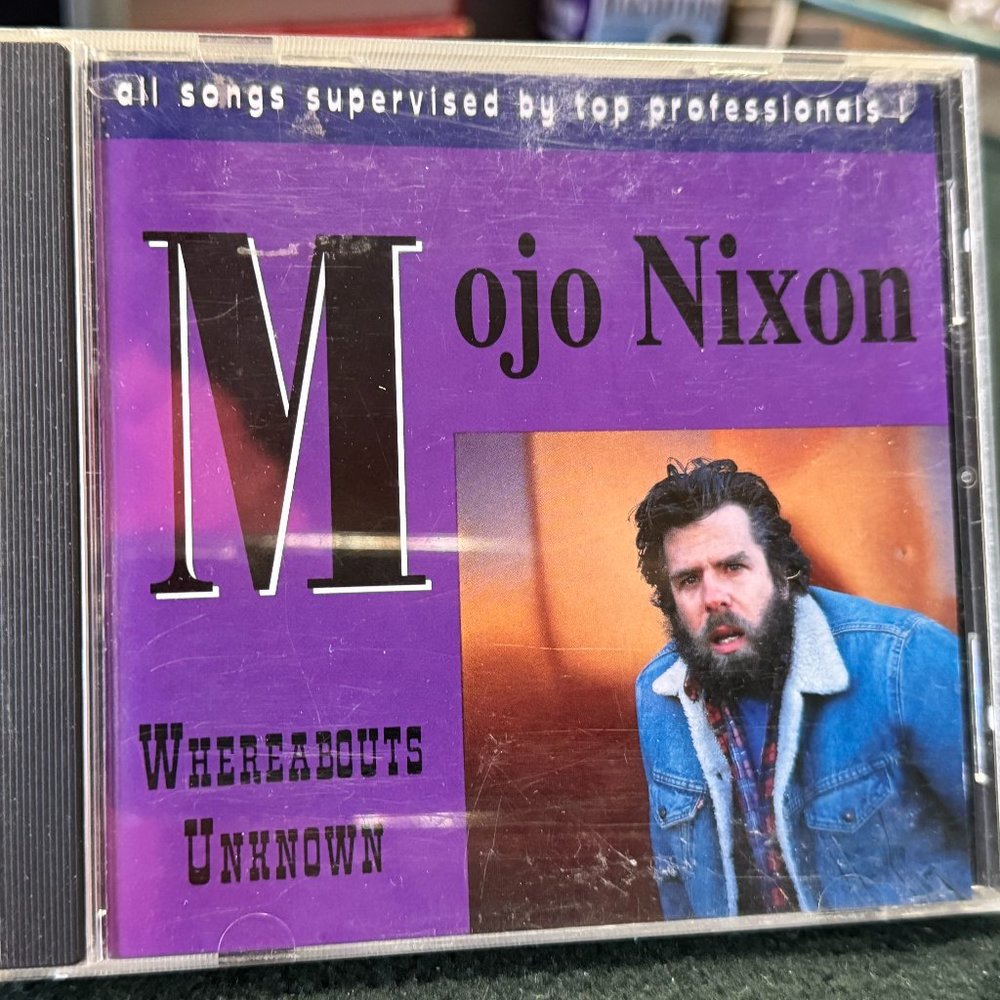 MOJO NIXON'S "WHEREABOUTS UNKNOWN" COMPACT DISC * GREAT CONDITION * USED